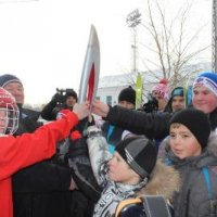 Арсеньеву передан факел Сочинской Олимпиады. Фото